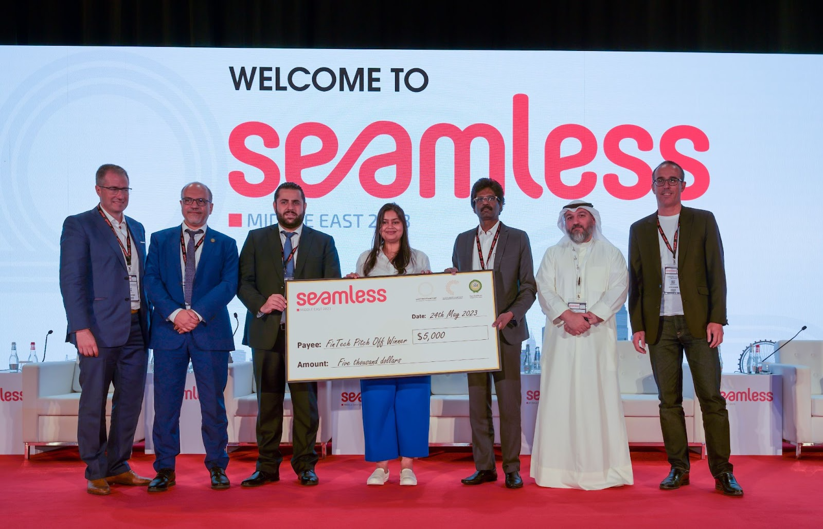 Ali Abulhasan and the panel of judges with the winner of the Seamless Startup Pitch-Off: Sav